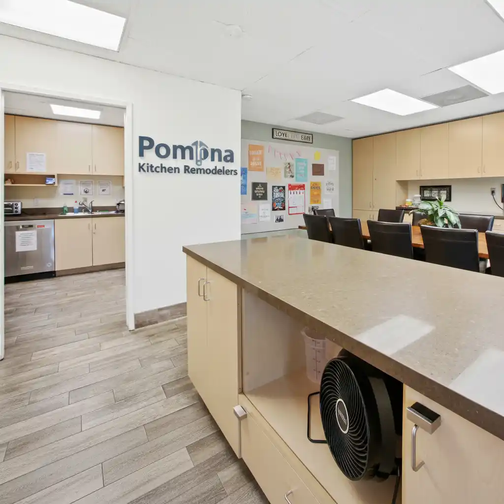 Pomona Kitchen Remodelers office interior with company branding and logo